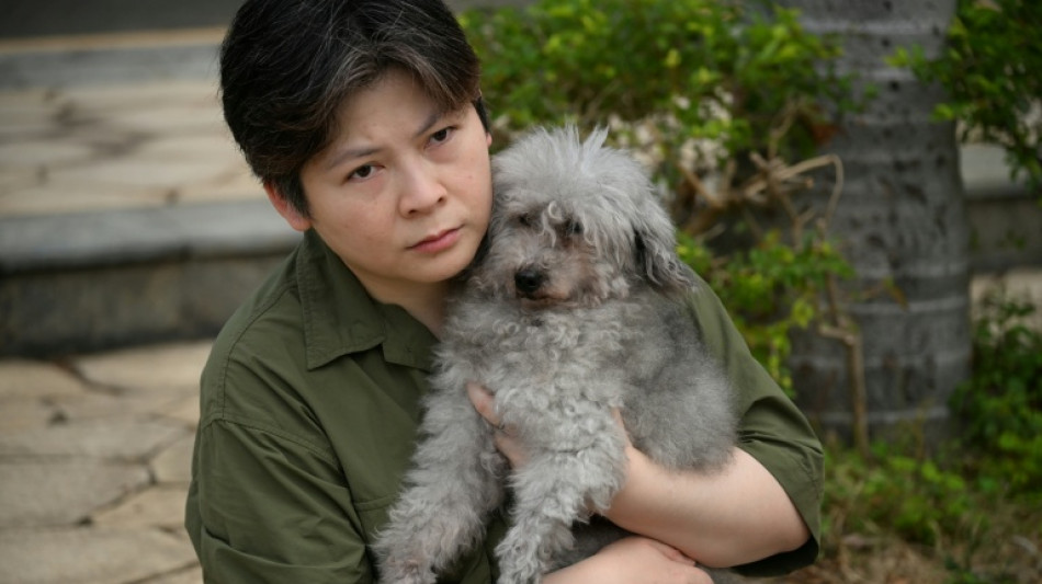 A Hong Kong, l'angoisse des propri&eacute;taires d'animaux de compagnie pi&eacute;g&eacute;s dans les flammes