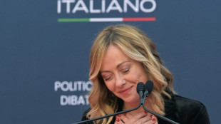 Italy's Meloni throws party to celebrate record in power