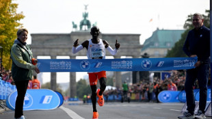 'One rabbit at a time' says marathon magician Kipchoge after smashing record