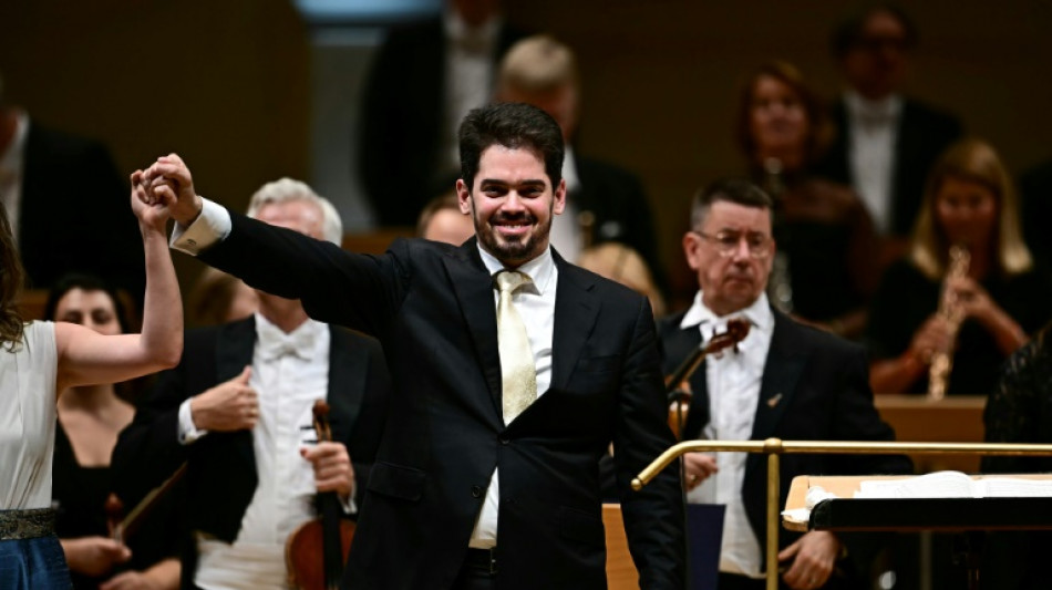 Germany's Merz criticises festival for axing Israeli conductor