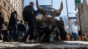 Stocks mostly rise, precious metals slip in quiet Asian trade