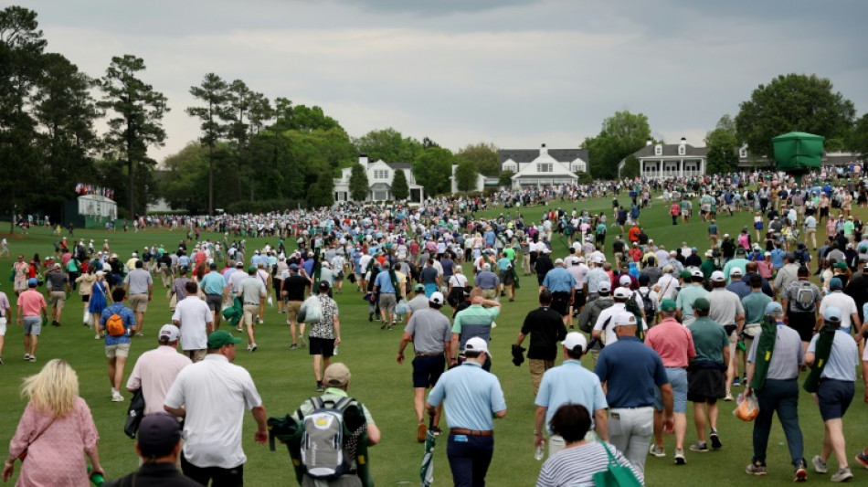 Masters play halted until Saturday