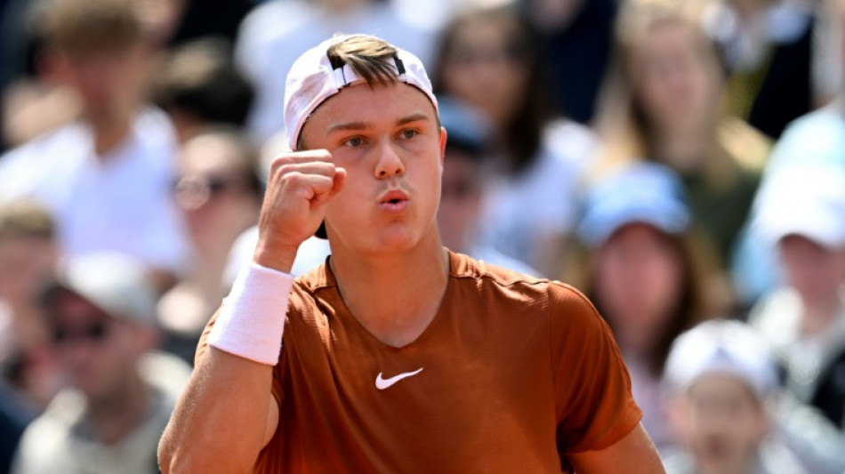 Struggling Rune saves four match points to win second straight Munich title