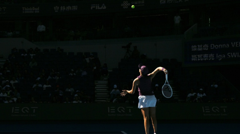 Swiatek, Zheng survive three-set tests in China Open third round