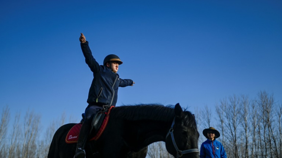 Beijing kids with autism get help from horses
