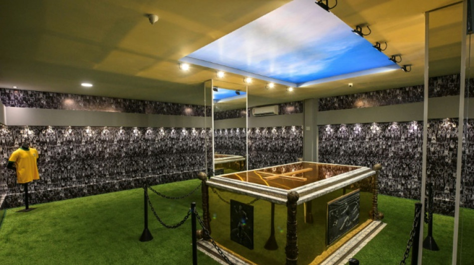 Pele's gilded, turf-lined tomb opens to public in Brazil
