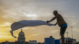 Cubans find rest on rooftops as blackouts drive them from home