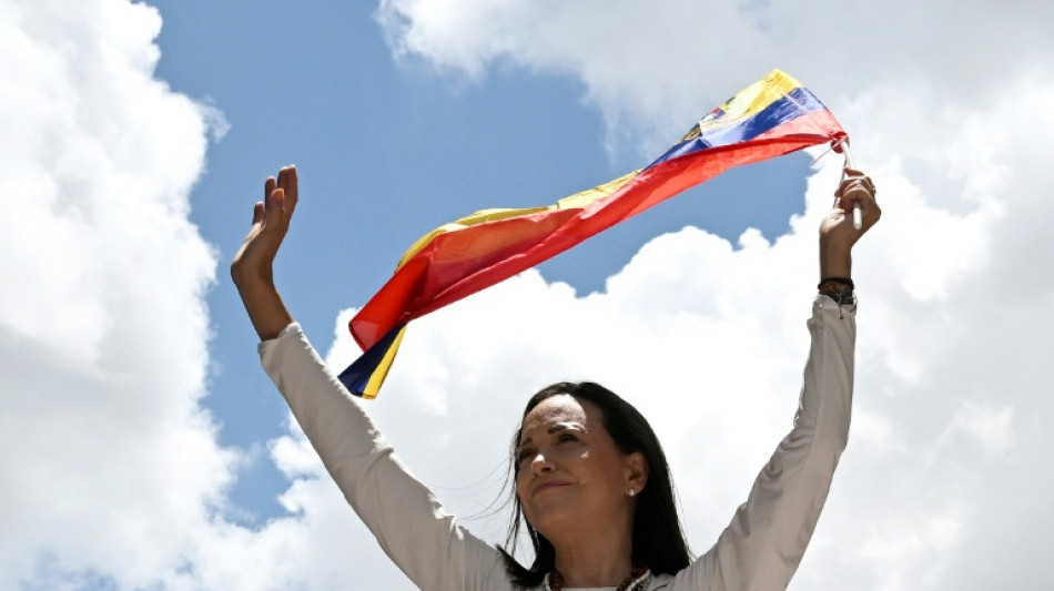 Oposi&ccedil;&atilde;o da Venezuela, liderada por Machado, marcha contra posse de Maduro 