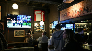 Em um pub de Moscou, Jogos de Inverno fazem clientes esquecer a pol&iacute;tica