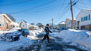 Northeast US faces power cuts and school closures after snowstorm
