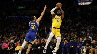 Lakers topple Warriors to advance, Heat reach East finals