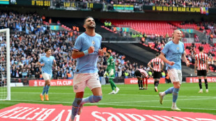 Mahrez treble fires Man City into FA Cup final 