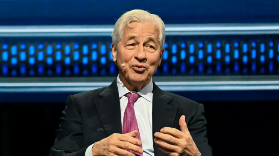 JPMorgan Chase reports mixed results as Dimon defends Fed chief